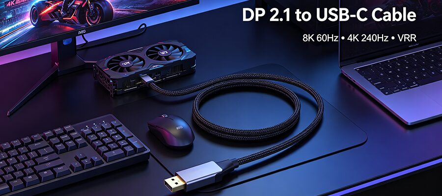 Black braided DP 2.1 to USB-C cable connected to gaming PC and 8K high refresh monitor
